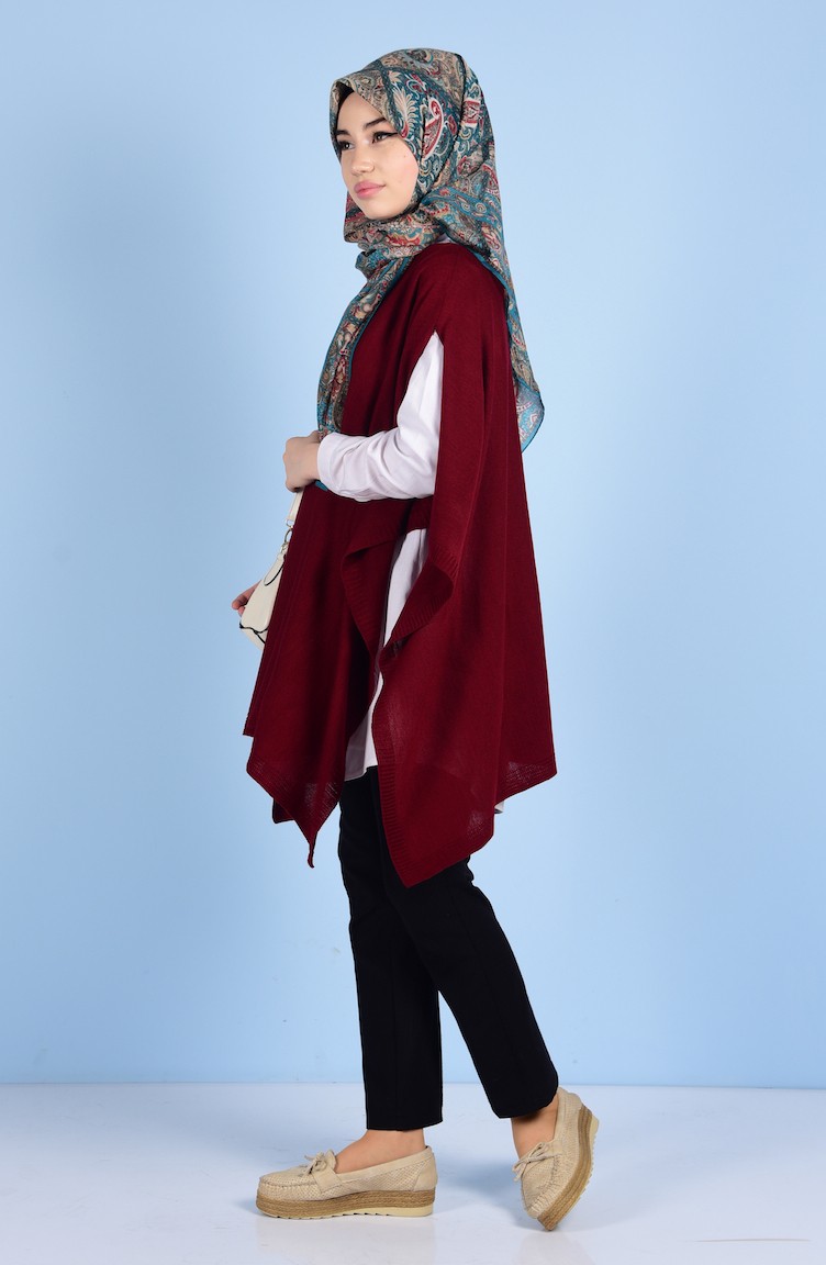 File desenli boğazlı püsküllü panço modeli File desenli boğazlı püsküllü panço modeli