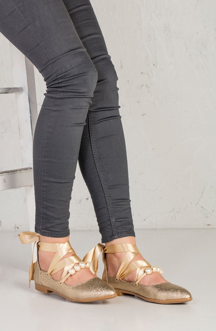 gold color flat shoes