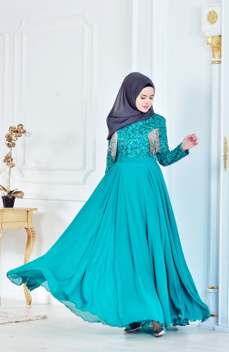 فستان يتميز بتفاصيل من الترتر 8014-01 لون اخضر زُمردي 8014-01