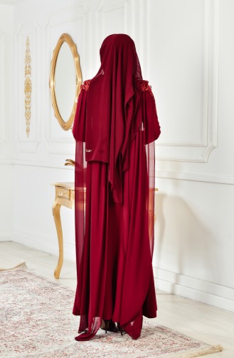 فستان يتميز بتفاصيل من الدانتيل 4010-04 لون خمري 4010-04