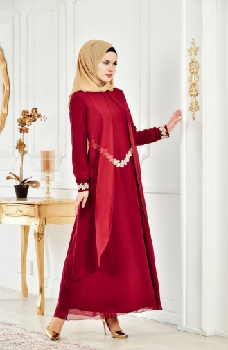 فستان سهرة يتميز بتفاصيل من الدانتيل 1067-03 لون خمري 1067-03