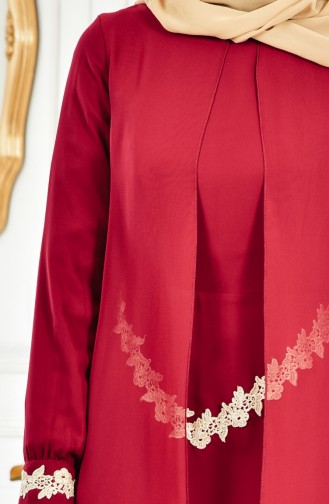فستان سهرة يتميز بتفاصيل من الدانتيل 1067-03 لون خمري 1067-03