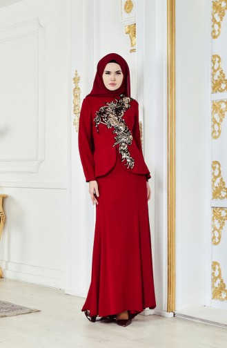 فستان يتميز بتفاصيل من الترتر بمقاسات كبيرة 701028-01 لون خمري 701028-01