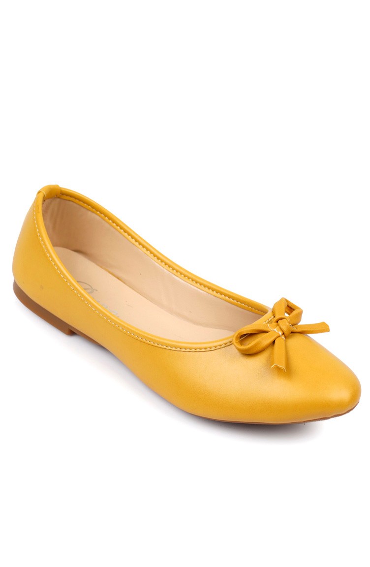 mustard colored flat shoes