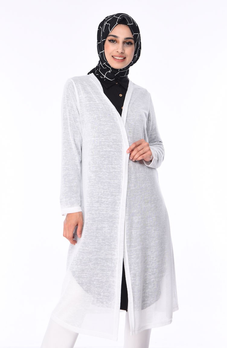 white cardigan over dress