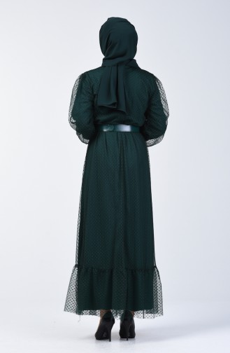 فستان سهرة بحزام بتفاصيل ريش أخضر زمردي 2002-03