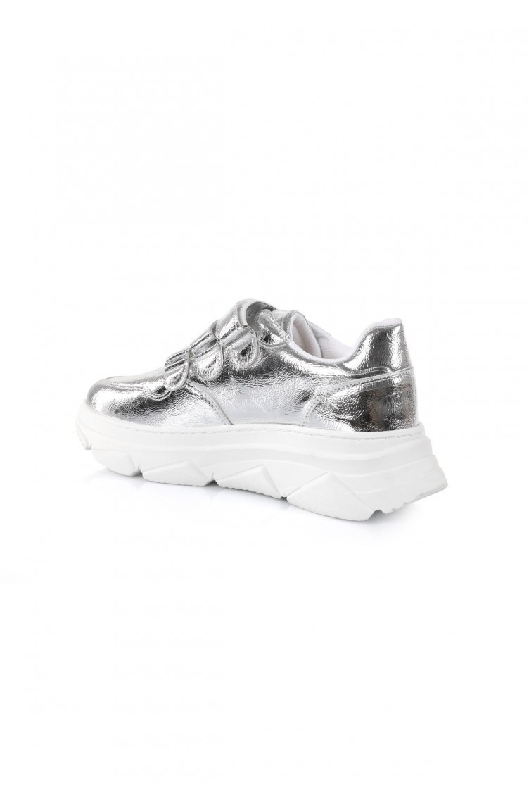 silver colored sneakers