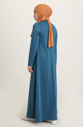 فستان بتصميم مزينة بتتفاصيل 1031-01 لون بترولي 1031-01