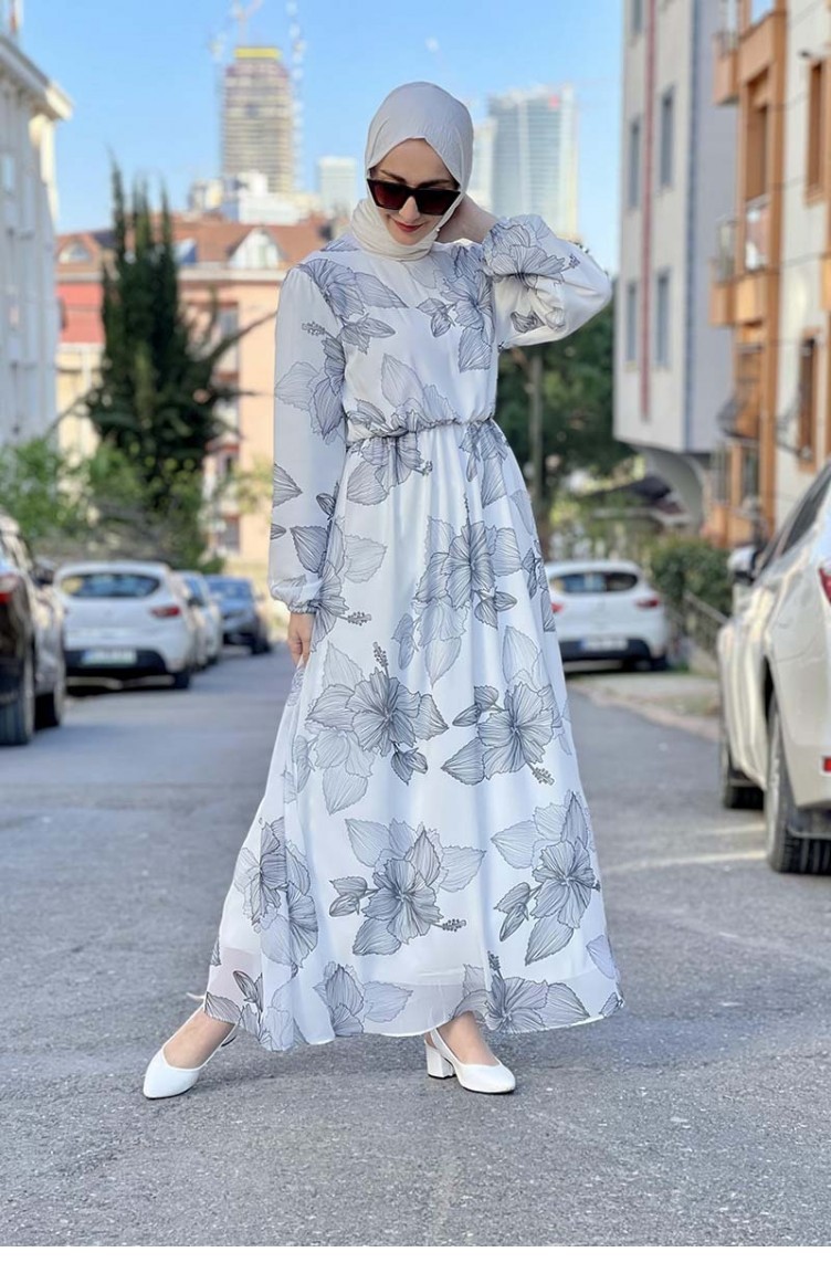 White gown deals with hijab