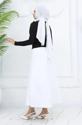 بلوزة بياقة مدورة وأزرار مفصلة 71267-04 سوداء 71267-04