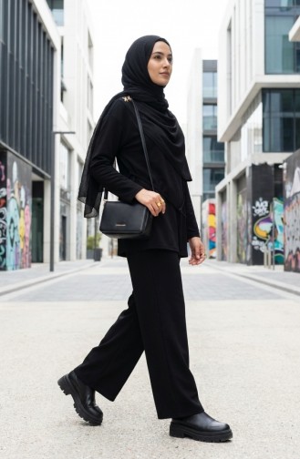 طقم مكون من قطعتين: تونيك وبنطال بتصميم منسدل مزين بتفاصيل النجوم، رقم الموديل 2209-02، اللون أسود 2209-02