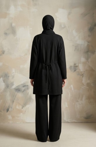 طقم مكون من قطعتين: تونيك وبنطال بتصميم منسدل مزين بتفاصيل النجوم، رقم الموديل 2209-02، اللون أسود 2209-02