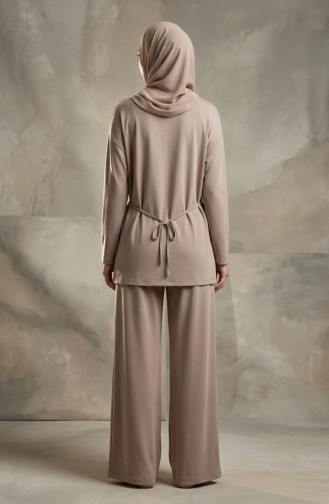 طقم مكون من قطعتين: تونيك وبنطال بتصميم منسدل مزين بتفاصيل النجوم، رقم الموديل 2209-04، لون المنك 2209-04