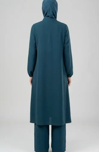 Tweedelige Set Bestaande Uit Een Tuniek En Een Broek Van Aerobin-stof Model 4142-11 Petrol. 4142-11