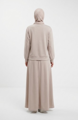 طقم مكون من قطعتين: تونيك وتنورة، مزين بفيونكة، رقم الموديل 0237-01، لون بيج. 0237-01