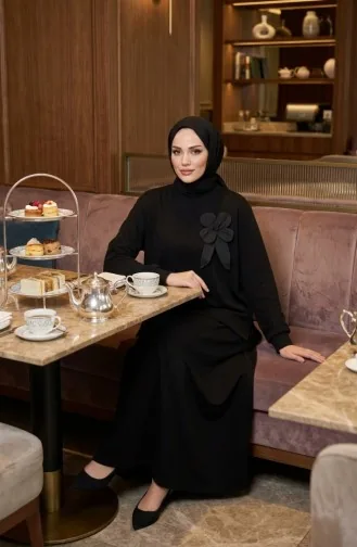 طقم مكون من قطعتين: تونيك وتنورة، مزين بفيونكة، رقم الموديل 0237-04، لون أسود 0237-04