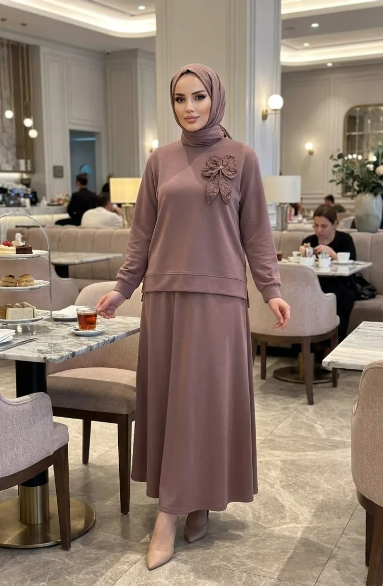 طقم مكون من قطعتين: تونيك وتنورة، مزين بفيونكة، رقم الموديل 0237-06، لون المنك 0237-06