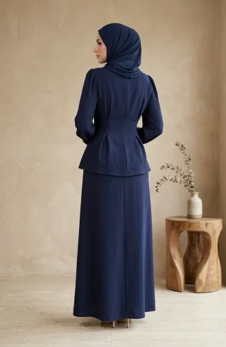 طقم مكون من قطعتين من الكتان، بلوزة وتنورة بأزرار، لون كحلي 0277-04 0277-04